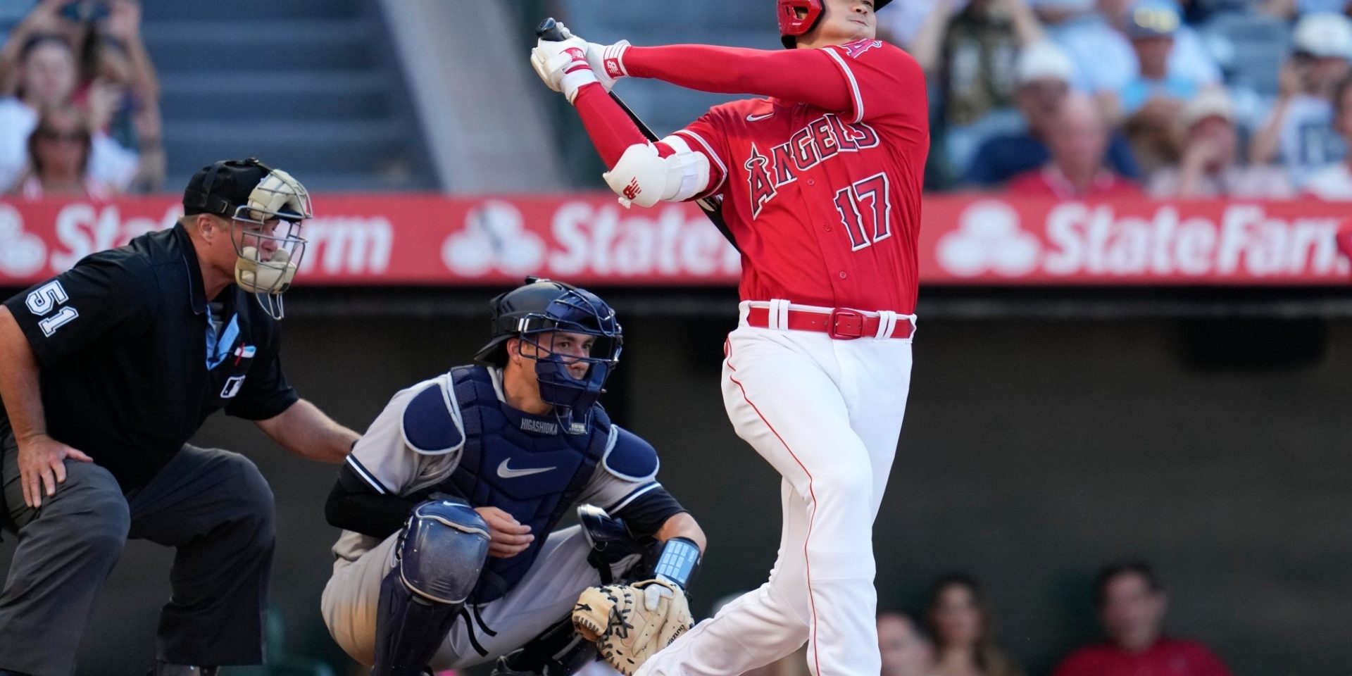 Los Angeles Angels designated hitter Shohei Ohtani (17) swings a strike during the eighth inning of a baseball game against the New York Yankees in Anaheim, Calif., Wednesday, July 19, 2023. (AP Photo/Ashley Landis)