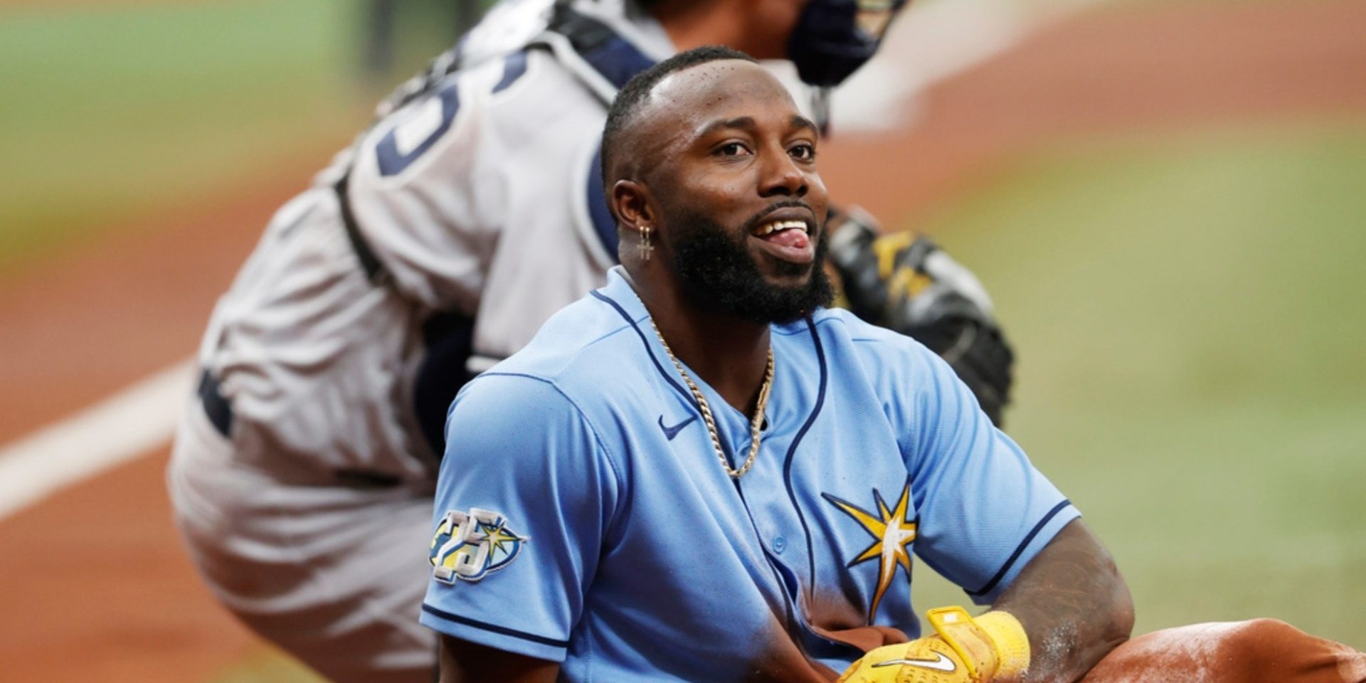 Tampa Bay Rays' Randy Arozarena reacts after scoring on a throwing error by New York Yankees center fielder Harrison Bader during the first inning a baseball game Sunday, Aug. 27, 2023, in St. Petersburg, Fla. (AP Photo/Scott Audette)