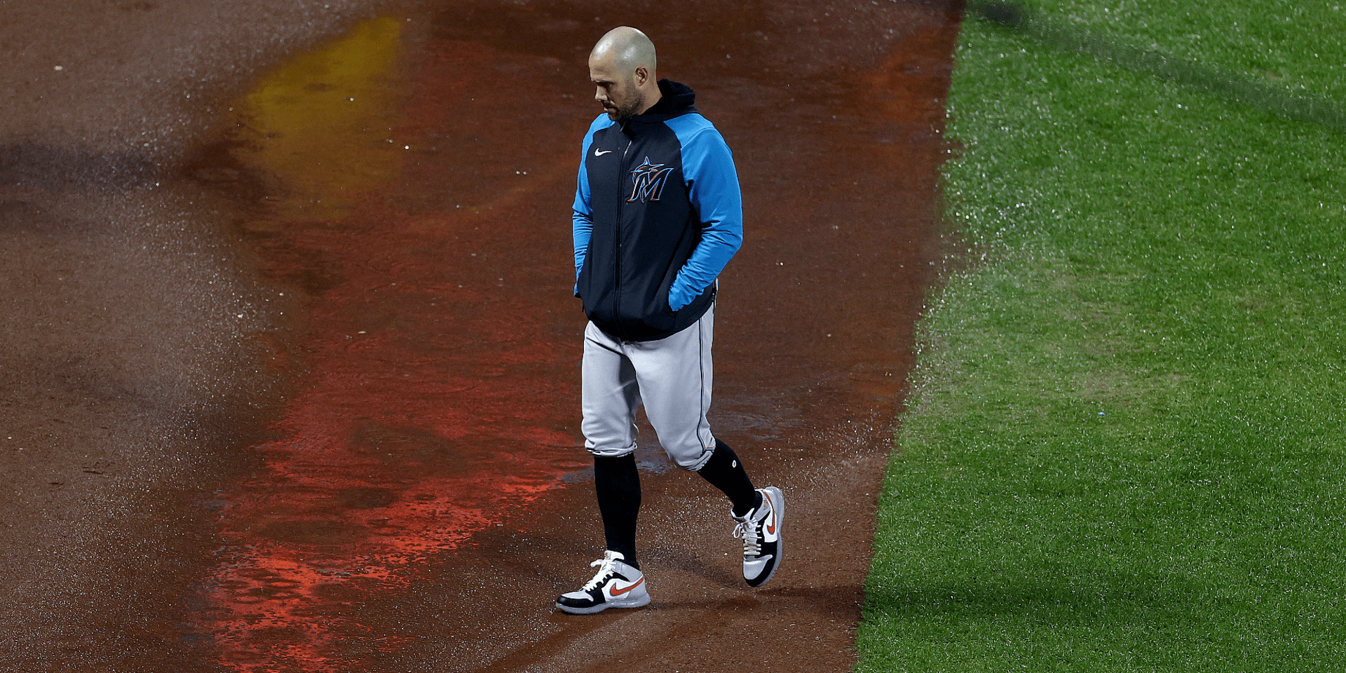 Marlins-Mets game suspended: What rainout means for Miami's schedule, playoff scenarios