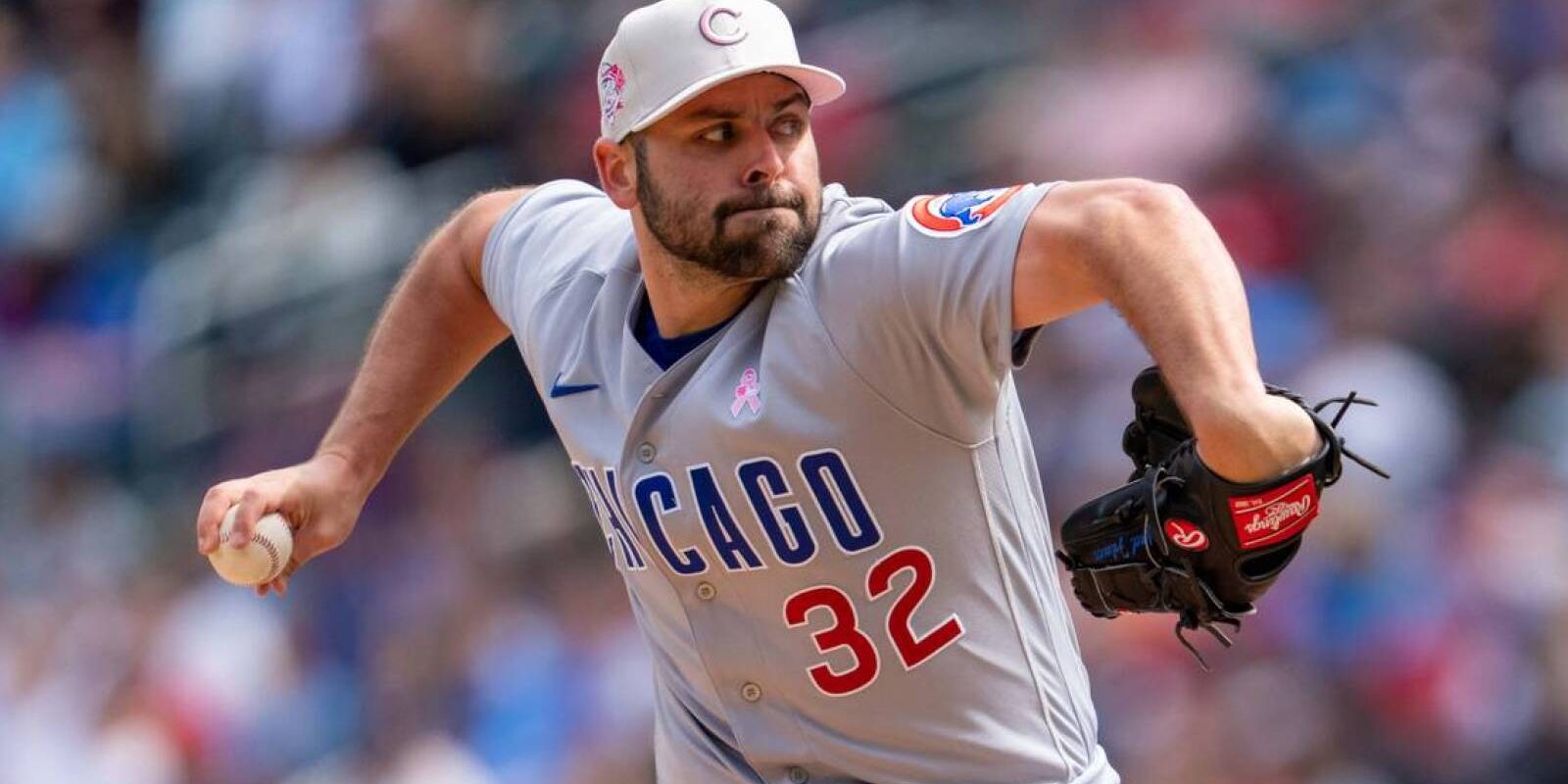 May 14, 2023; Minneapolis, Minnesota, USA; Chicago Cubs relief pitcher Michael Fulmer (32) pitches in the eighth inning against the Minnesota Twins at Target Field. Mandatory Credit: Matt Blewett-USA TODAY Sports