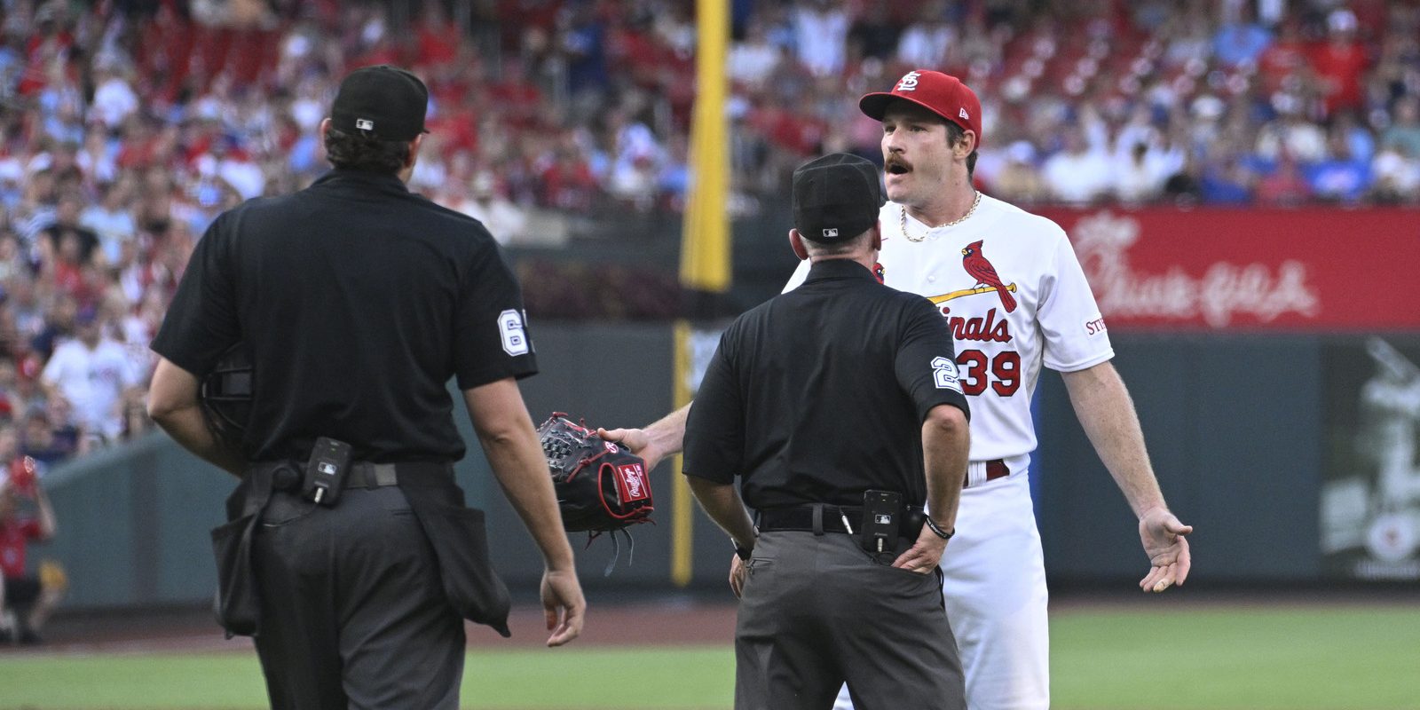 MLB punishes Cardinals for throwing at Cubs
