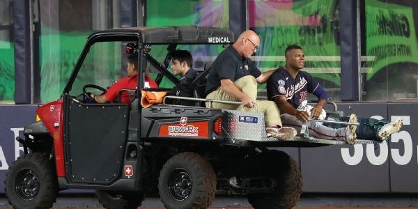 Nationals' Garrett carted off with injured ankle