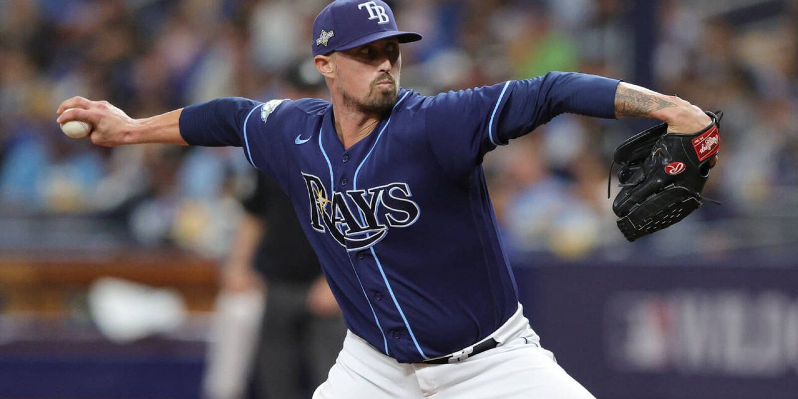Oct 4, 2023; St. Petersburg, Florida, USA; Tampa Bay Rays relief pitcher Shawn Armstrong (64) pitches against the Texas Rangers in the seventh inning during game two of the Wildcard series for the 2023 MLB playoffs at Tropicana Field. Mandatory Credit: Nathan Ray Seebeck-USA TODAY Sports